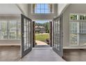 Grand foyer with high ceilings and view of the home's exterior at 420 Gold Xing, Canton, GA 30114
