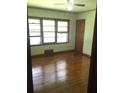 Bright bedroom with wood floors and natural light, offering a comfortable and inviting retreat at 1410 Willis Mill Sw Rd, Atlanta, GA 30311