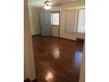Inviting living room featuring hardwood floors and a well-lit atmosphere, creating a warm and welcoming space at 1410 Willis Mill Sw Rd, Atlanta, GA 30311