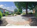 Charming building exterior surrounded by manicured landscaping and lush greenery at 5200 Peachtree Rd # 1104, Atlanta, GA 30341