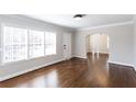 Bright living room with gleaming hardwood floors, fresh paint, and plenty of natural light at 469 Mellview Sw Ave, Atlanta, GA 30310
