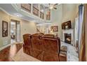 Bright and open living room with fireplace, tall ceilings, and elegant decor at 1239 Side Step Trace, Lawrenceville, GA 30045