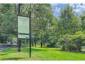 Lush green park with mature trees and inviting walking paths offering a serene escape at 1634 Ponce De Leon Ne Ave # 512, Atlanta, GA 30307