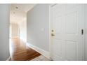 Bright hallway with beautiful hardwood floors and white trim in a luxurious apartment at 3657 Peachtree Ne Rd # 4A, Atlanta, GA 30319