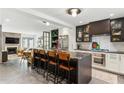Open kitchen with a large center island, modern appliances, and stylish cabinetry at 1767 Defoor Nw Ave # D, Atlanta, GA 30318
