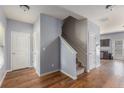 Inviting entryway with hardwood floors, stairs leading to the upper level, and convenient access to other living spaces at 27 Autumn Canyon Se Path, Cartersville, GA 30121