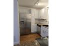 The kitchen has stainless steel appliances, granite countertops, and ample cabinet space at 48 Peachtree Ne Ave # 321, Atlanta, GA 30305