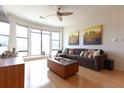 Inviting living room with a comfortable couch, natural light, and decorative pillows at 400 17Th St # 2325, Atlanta, GA 30363