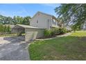 Carport connected to the home with easy access, perfect for parking and storage at 47 Powder Springs St, Hiram, GA 30141