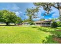 Inviting single-story home with a covered front porch and expansive lawn at 1997 Villa Rica Hwy, Dallas, GA 30157