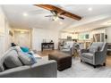 Bright and airy living area with comfortable seating and an open layout to the modern kitchen at 195 Ansley Ct, Roswell, GA 30076