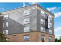 Detailed building exterior highlighting architectural details and window placements at 390 17Th Nw St # 6055, Atlanta, GA 30363