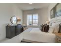 Serene bedroom features neutral decor, natural light, and comfortable furnishings at 7310 Winderlea Ln, Cumming, GA 30040