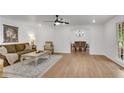 Spacious living room features hardwood floors, natural light and an open floor plan at 4309 King Valley Se Dr, Smyrna, GA 30082