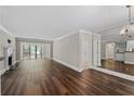 Elegant living room with hardwood floors, fireplace, and access to a balcony at 1120 Highland Bluff Se Dr, Atlanta, GA 30339
