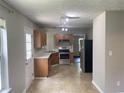 Functional kitchen with stainless steel appliances, oak cabinets, and a view to the back at 5465 Twin Lakes Dr, College Park, GA 30349