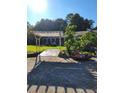 A rustic pergola graces this yard with a charming countryside appeal at 435 Johnson Ferry Nw Rd, Atlanta, GA 30328