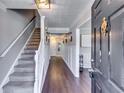 Welcoming entryway featuring hardwood floors, a staircase, and elegant details for a sophisticated first impression at 845 Connell Ln, Lawrenceville, GA 30044