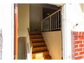 View from the front door showing a wooden staircase ascending to the home's upper level at 2831 Carolyn Se Dr, Smyrna, GA 30080