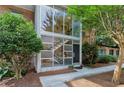 Exterior of building has large windows and doorway at 1240 Woodland Ne Ave # 7, Atlanta, GA 30324
