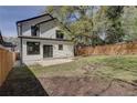 Expansive backyard featuring a newly seeded lawn with a privacy fence. A perfect outdoor space for relaxation and entertainment at 1456 S Gordon Sw St, Atlanta, GA 30310