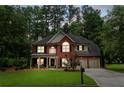 Beautiful two-story home on a large, wooded lot, perfect for privacy at 4401 Madison Woods Nw Dr, Marietta, GA 30064