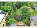 Aerial view of property showcasing a lush, private backyard with mature trees at 935 Cumberland Ne Rd, Atlanta, GA 30306