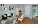 Cozy living room showcasing hardwood floors and an inviting view into the kitchen at 2023 Oakview Se Rd # 226, Atlanta, GA 30317