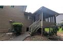 An enclosed, screened-in back porch accessible by stairs at 3778 Glen Mora Dr, Decatur, GA 30032