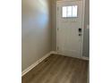 Welcoming entryway with durable floors and a stylish front door at 3708 Cheswolde Ave # 95, Powder Springs, GA 30127