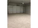 Spacious two-car garage with ample room for parking and storage at 3708 Cheswolde Ave # 95, Powder Springs, GA 30127
