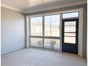 Inviting screened porch with ample natural light, perfect for relaxing outdoors at 3865 Shelleydale Dr # 82, Powder Springs, GA 30127