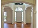 Bright foyer with large windows and a beautiful front door with sidelights at 2670 Henderson Chase Ct, Tucker, GA 30084