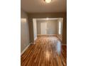 Open living room showcasing beautiful hardwood floors and natural light at 519 Roy Sw St, Atlanta, GA 30310