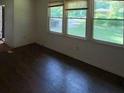 Bright living room with large windows allowing ample natural light at 2369 Christian Cir, Covington, GA 30016