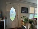 Bright entryway with decorative door and ample natural light from a nearby window at 2620 Northview Ave, Decatur, GA 30032