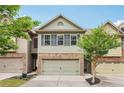 Charming townhome featuring a well-maintained yard and appealing facade at 146 Sunset Ln, Woodstock, GA 30189