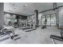 Well-equipped fitness center with treadmills, elliptical machines, and weight training equipment at 3040 Peachtree Nw Rd # 1713, Atlanta, GA 30305