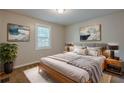 Calm bedroom with a plush bed, soft lighting, and neutral decor at 2245 Dauphine St, Atlanta, GA 30344