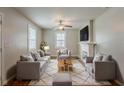 Inviting living room featuring a fireplace, plush seating, and ample natural light at 2245 Dauphine St, Atlanta, GA 30344