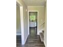 Inviting entryway featuring updated flooring, fresh paint, and a view into the modern kitchen at 3800 Leisure Ln, Atlanta, GA 30349