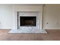 Close up view of the marble fireplace at 133 Magazine St, Dallas, GA 30157