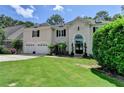 Beautiful home with a well-maintained front yard, perfect for curb appeal and outdoor enjoyment at 5245 Cottage Farm Rd, Johns Creek, GA 30022