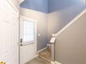 Inviting entryway with gray walls, white doors, and modern flooring at 6726 Gallant Se Ct # 30, Mableton, GA 30126