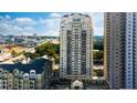 Exterior shot of high-rise apartment complex with well-maintained grounds at 795 Hammond Dr # 813, Sandy Springs, GA 30328