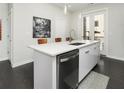 Contemporary kitchen showcasing stainless steel dishwasher, sleek white cabinets, and modern design at 415 Gartrell Se St # 16, Atlanta, GA 30312