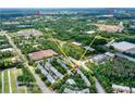 Aerial view showing proximity to Downtown Alpharetta, Avalon, Wills Park, and Ameris Bank Amphitheater at 11352 Musette Cir, Alpharetta, GA 30009