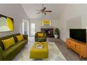 Bright living room featuring a fireplace, modern decor, and lots of natural light at 1006 Eagle Vw, Lawrenceville, GA 30044