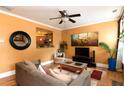 Stylish living room features hardwood floors, fireplace, and an open view to the kitchen at 1190 Hardee Ne St, Atlanta, GA 30307
