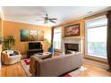 Bright living room features a fireplace, hardwood floors, and ample natural light at 1190 Hardee Ne St, Atlanta, GA 30307